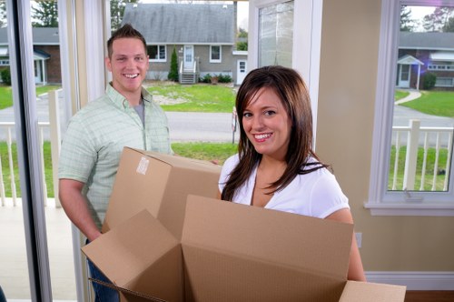 Furniture and boxes being transported by local movers