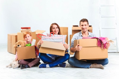 Careful apartment move in Highbury with stairs and protective packing materials