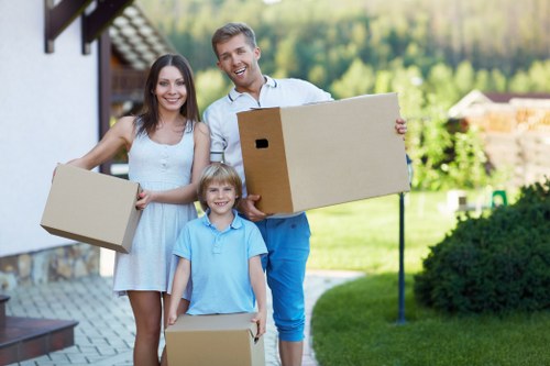Moving van and home contents outside a Highbury property