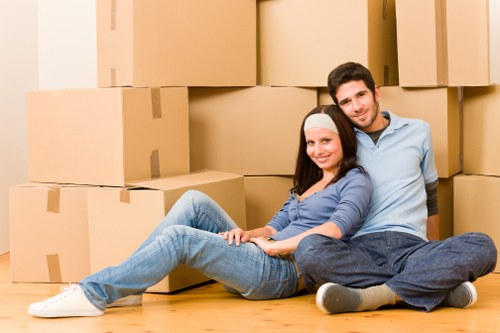 Moving team handling furniture near Highbury residential properties