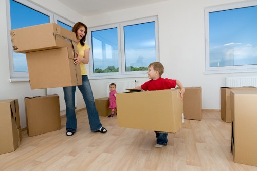 Packing office equipment for a business move in Highbury