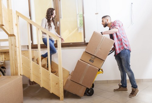 Local movers handling office equipment in Highbury