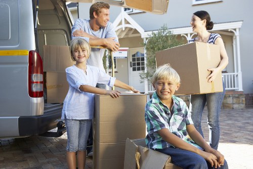 Packed boxes and furniture ready for a house move in Highbury