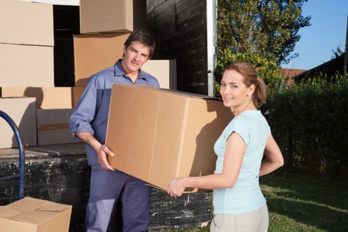Local movers handling packing for a Highbury apartment building